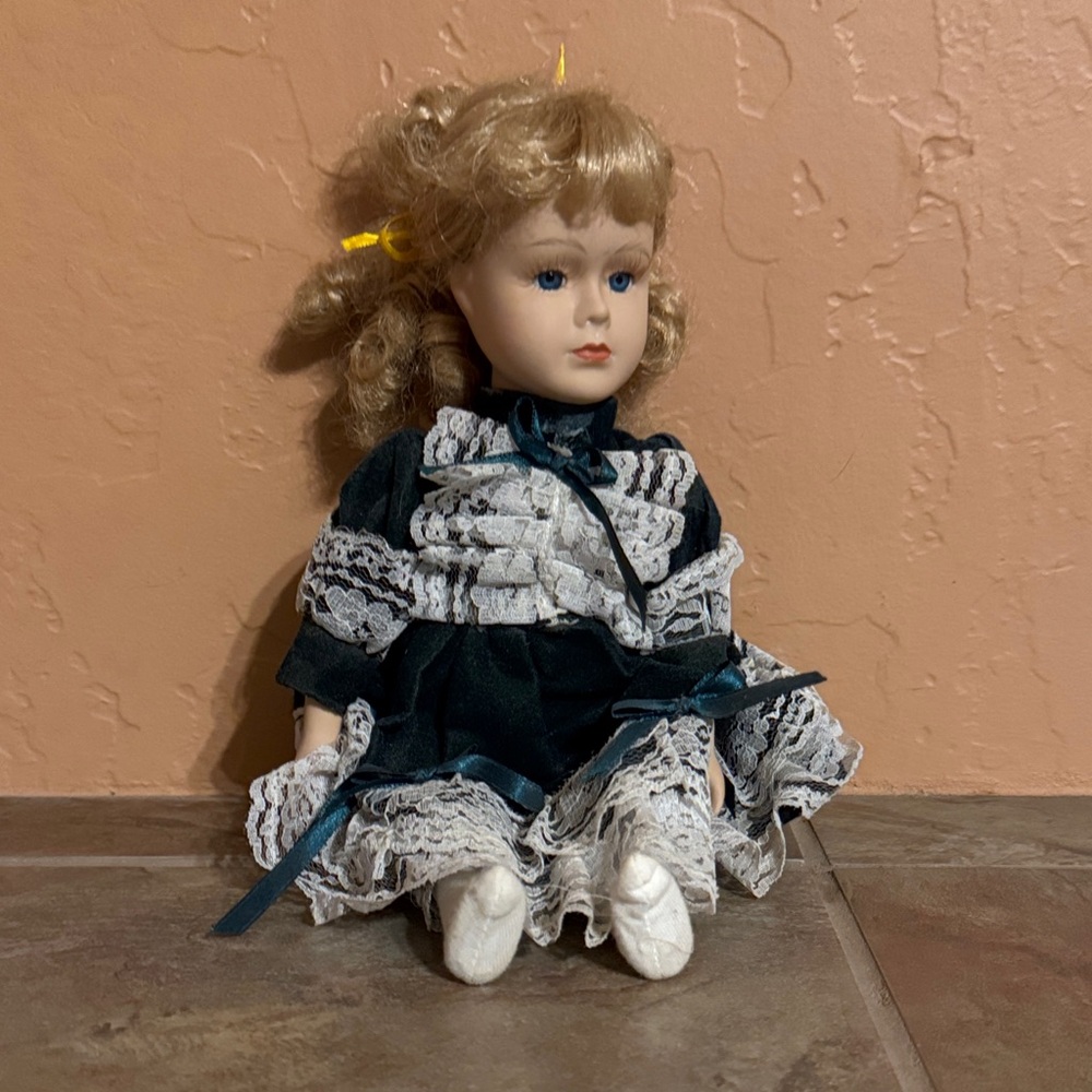 Classic Porcelain Doll with Blue Dress and Blonde Hair